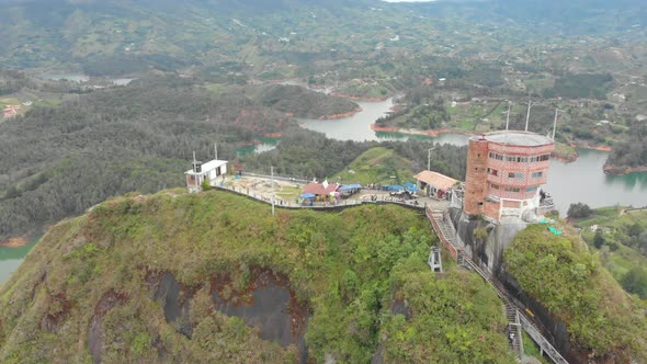 Rock Of Guatape With Viewing Point On Top, Tourist site of Colombia - aerial drone shot