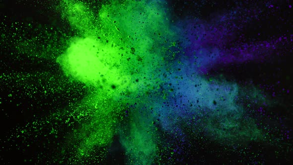 Ultra Slowmotion Shot of Color Powder Explosion Isolated on Black Background