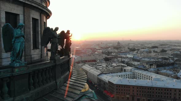 Sun rays light church in Petersburg with golden dome alt