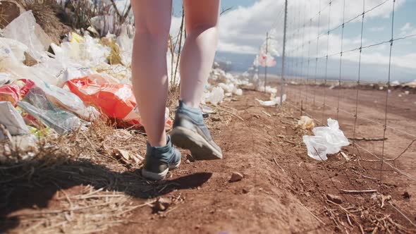 Close Up of Plastic Pollution on Hawaii Island Woman Exploring Landfill  USA