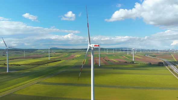 Aerial View of Wind Turbines Farm in Field. Austria. Drone View on Energy Production