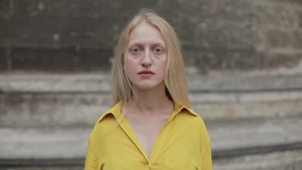 Crop View of Serious Woman Looking To Camera with Emotions of Melancholy and Sadness . Portrait of