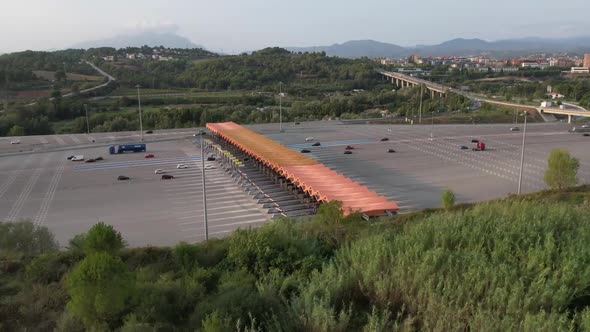 Aerial Hyperlapse Over Toll Booth At Martorell Motorway In Barcelona. Circle Dolly