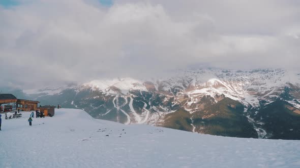 Winter Panorama with Ski Lifts and Snow Covered Mountains on a Sunny Day. Mountains Ski Elevator in