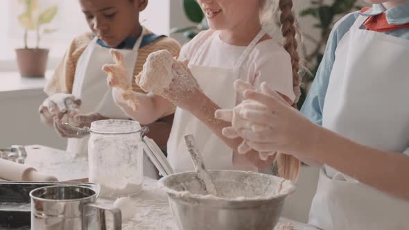 School Boys and Girls Preparing Pastry 