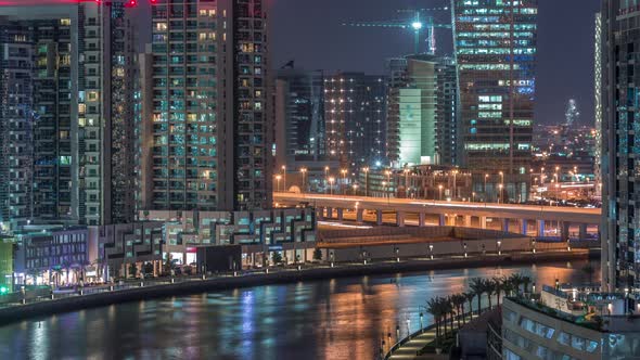 The Rhythm of Bright Dubai Near Canal Aerial Timelapse