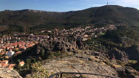 Slow pan on town of Belogradchik by the day 4K 2160p 30fps UltraHD footage - Small settlement in  We