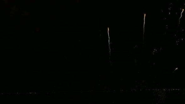 Colorful Firework display at night on sky background alt