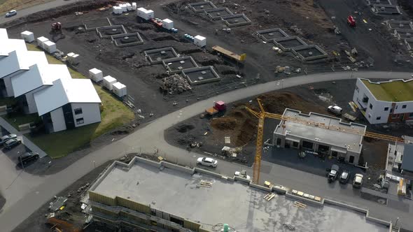 Bird's-Eye View Of The Constructed Establishments, Housing, Installed Tower Cranes And Vehicles In R