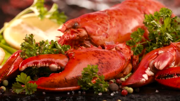 Freshly Prepared Lobsters Served with Vegetables and Fruits for Real Gourmets in the Restaurant.