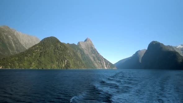 View from the back of a boat to the amazing Milford Sound and Mitre Peak