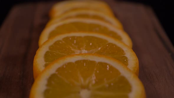 Close Up Of Orange Slices And Zest Panning Up