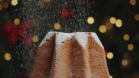 Sugar powder falling on panettone at Christmas
