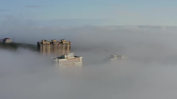 Drone View of the Vladivostok Lowland Covered in Morning Sea Mist at Dawn