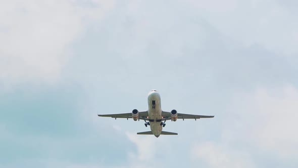 the plane goes on take-off flying over the camera