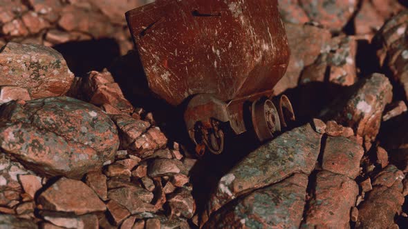 Abandoned Rusty Mine Cart on Rocks