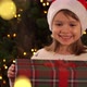 Girl Opens Box with Light Surprised and Happy - VideoHive Item for Sale