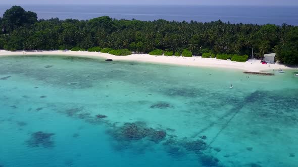 Aerial panorama of island beach by sea with sand background