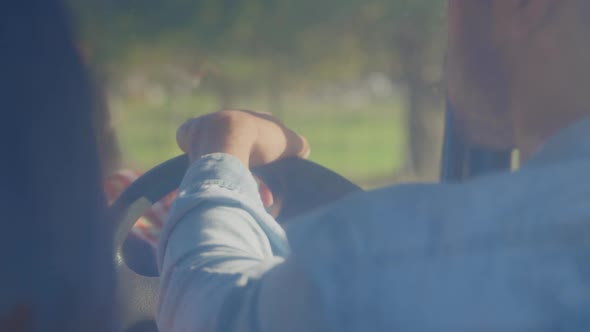 Young couple on a road trip in their pick-up truck