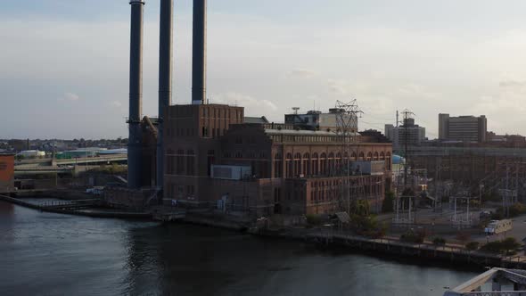 Power station, harbor and cityscape along a river in the industrial area of Providence, Rhode Island