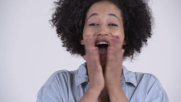 Face of Young Happy African Woman Looking Surprised