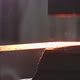 Blacksmith Using Hammer Machine for Shaping Hot Metal Blank in Forge Workshop - VideoHive Item for Sale