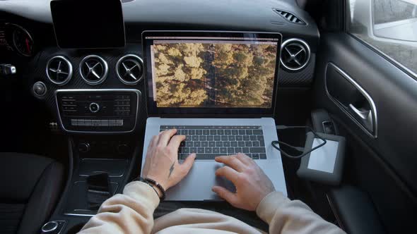 Freelance Photographer Works Remotely From Car