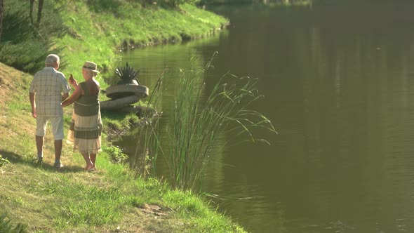 Romantic Walk Near River in Sunny Day.