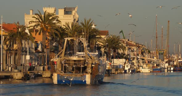 Le Grau du Roi, Gard, France. Fishing boats coming back to the harbour.