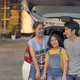 Slow motion Happy family sitting on the car front of home - VideoHive Item for Sale