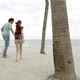 Young couple running on beach - VideoHive Item for Sale