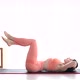 Fitness woman doing abs crunches exercise lying flat on floor training at home. - VideoHive Item for Sale