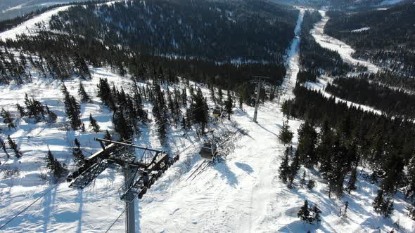 Modern Ski Lifts Lift People Up the Mountain in a Tourist Resort Aerial View