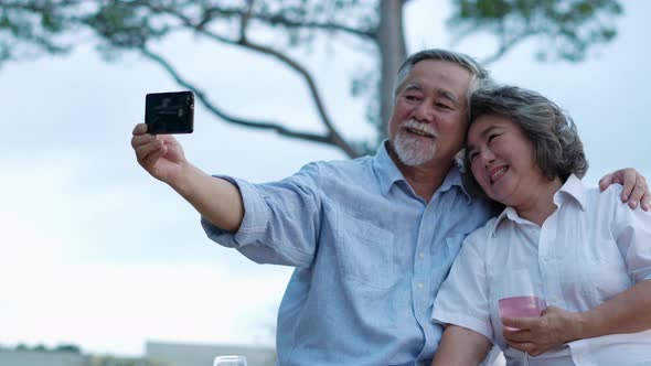 Couple senior selfie with smartphone