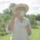 Senior Caucasian Woman Drinking Tea in Her Garden - VideoHive Item for Sale