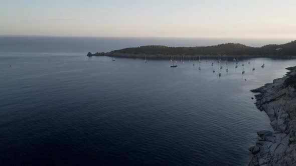 Aerial view of Lacona bay at sunset, Elba Island, Tuscany, Italy.