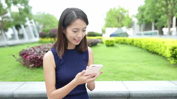 Woman using mobile phone