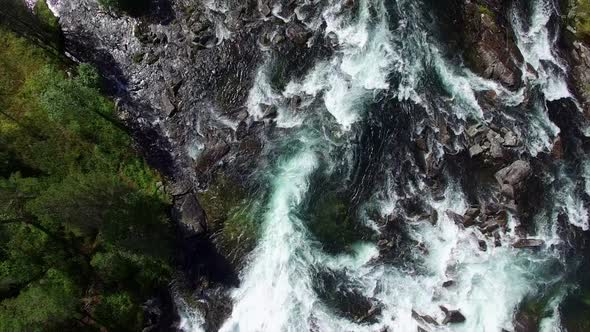 Flying above river with rapids in Norway