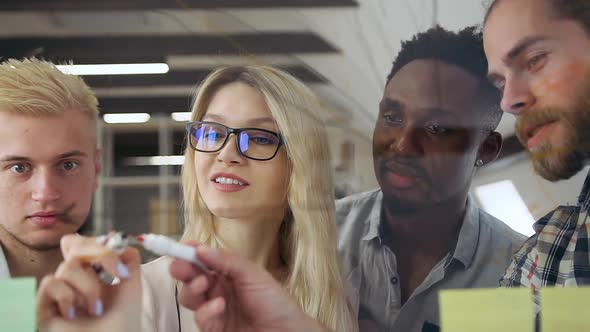 Office People Working Together in Office Room on Glass wall to Model the Best Version