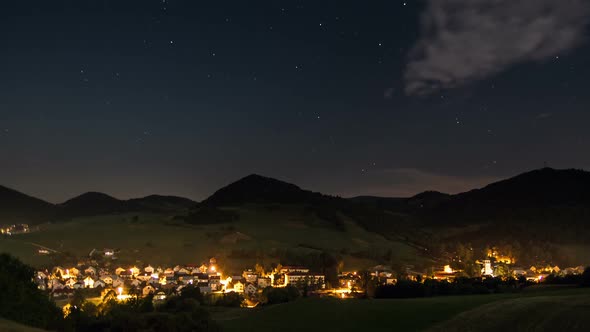 Night Traffic in Countryside Time Lapse. Romantic Evening with Moving Stars