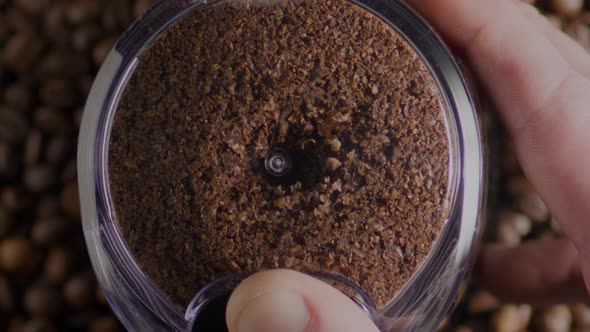 Ground Coffee Rotating Grinder Close Up Top View