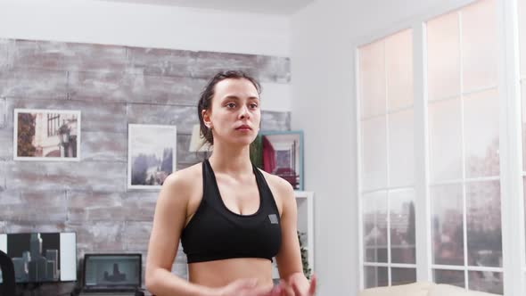 Fitness Woman Doing a Breathing in and Breathe Out Exercise