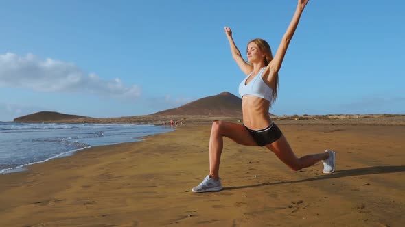 Yoga Retreat and Training - Woman in Yoga Pose at Beach at Sunrise. Female Yoga Girl Working Out