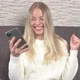 Exited smiling girl using smartphone, celebrating success, victory, achievement. - VideoHive Item for Sale