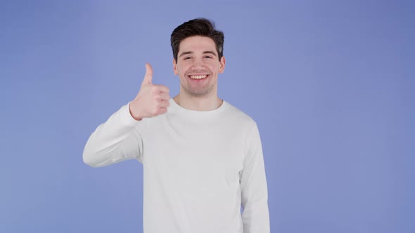 Handsome Young Man Shows Thumb Up Like Gesture