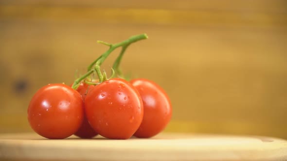 Red Tomatoes on a Wooden Table