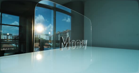 Glass Money Letters and Office in Background