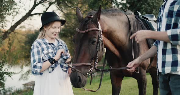 Funny Girl at a Photo Shoot with a Horse