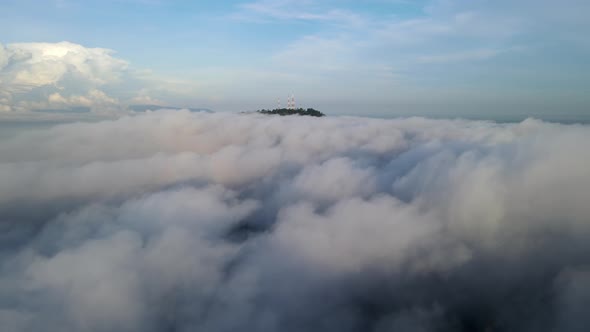 Aerial view fly over the thick cloud