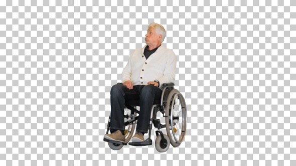 Old man sitting alone in a wheelchair and waiting, Alpha Channel